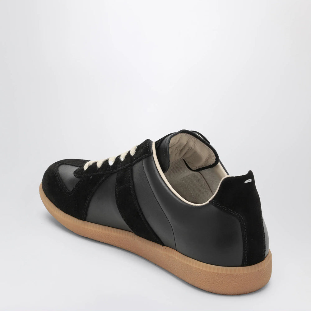 Maison Margiela - Replica sneakers in black Brand Apparel & Accessories > Shoes
